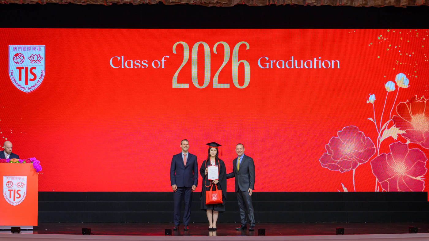 TIS-Graduation-2026-Valedictorian-Award-Presented-By-TISPA-Representatives-Mr.-Lipson-and-Mr.-Plas.jpg